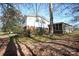 The backyard is spacious, with a brick foundation, and a lovely screened in back porch at 544 Stoneybrook Rd, Statesville, NC 28677