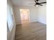 Bright bedroom featuring luxury vinyl plank flooring and a stylish ceiling fan at 544 Stoneybrook Rd, Statesville, NC 28677