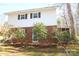 Charming exterior of this two-story home featuring a brick foundation and lush landscaping at 544 Stoneybrook Rd, Statesville, NC 28677
