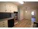 Bright and clean kitchen with stainless steel appliances and white cabinets at 544 Stoneybrook Rd, Statesville, NC 28677
