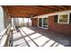 Inviting screened-in back porch with a wooden ceiling and a fan for added comfort at 544 Stoneybrook Rd, Statesville, NC 28677