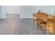 Open living room with hardwood floors and natural light at 5700 Carmel Station Ave, Charlotte, NC 28226