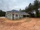 Lovely home featuring shingle siding and a covered porch at 5947 Tipperary Dr, Denver, NC 28037