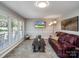 Bright living room featuring a large window, hardwood floors and modern lighting at 601 Wilmar Nw St, Concord, NC 28025
