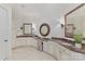 Bright main bathroom featuring double vanities and elegant mirrors at 7295 Three Sisters Ln, Concord, NC 28027