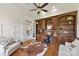Spacious office with hardwood floors, custom built-ins, and ample natural light at 7295 Three Sisters Ln, Concord, NC 28027