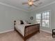 Bedroom with natural light, a ceiling fan and comfortable bed at 8015 Greenview Terrace Ct, Charlotte, NC 28277