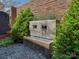 This relaxing water feature in the backyard has lush greenery, making it a private oasis at 8015 Greenview Terrace Ct, Charlotte, NC 28277