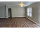 Comfortable living area with wood floors, ample natural light, and a welcoming atmosphere at 8502 Simpson Rd, Waxhaw, NC 28173
