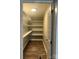 Walk-in pantry boasts built-in shelving for optimal storage and organization at 8502 Simpson Rd, Waxhaw, NC 28173