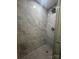 Modern tiled walk-in shower features gray tiling and modern fixtures at 8502 Simpson Rd, Waxhaw, NC 28173