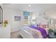 Bright bedroom featuring a white bed frame, colorful accents, and a window that offers plenty of natural light at 882 Two Brothers Ln, York, SC 29745
