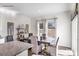 Dining room area featuring a large table, modern light fixture and plenty of natural light at 882 Two Brothers Ln, York, SC 29745