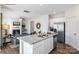 Open concept kitchen with granite counters, stainless steel appliances, island and view to the living room at 882 Two Brothers Ln, York, SC 29745