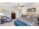 Comfortable main bedroom featuring a ceiling fan, a well-coordinated color palette, and ample natural light at 882 Two Brothers Ln, York, SC 29745