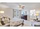Inviting main bedroom showcasing a dresser, natural light from a window, and an en-suite bathroom for convenience at 882 Two Brothers Ln, York, SC 29745