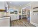 Bright kitchen with a large window over the sink and an open breakfast bar area at 1132 E Main St, Albemarle, NC 28001