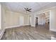 Open living space with hardwood floors, coffered ceilings, and seamless flow to other areas at 1132 E Main St, Albemarle, NC 28001