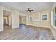 Spacious living room boasts coffered ceiling, fireplace, and natural light at 1132 E Main St, Albemarle, NC 28001