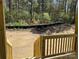Wooden stairs lead to backyard with trees and brush at 1259 Willow Grove Ln # 100, York, SC 29745