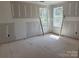 Bright bedroom with unfinished walls and dual windows providing natural light at 1259 Willow Grove Ln # 100, York, SC 29745