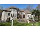 Lovely backyard featuring a pool with waterfall features, palm trees, and elegant outdoor seating areas, perfect for entertaining at 2017 Colorado Ct, Lancaster, SC 29720