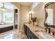 Luxurious bathroom with double sinks, granite countertops, tub and separate shower at 2017 Colorado Ct, Lancaster, SC 29720