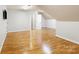 Spacious bonus room features hardwood floors, neutral walls, and natural light from an open doorway at 2017 Colorado Ct, Lancaster, SC 29720