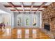 Inviting living room featuring a stone fireplace and hardwood floors at 2017 Colorado Ct, Lancaster, SC 29720