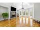 Bright living room with hardwood floors, fireplace, and large windows at 2017 Colorado Ct, Lancaster, SC 29720