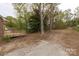 Large, expansive backyard with a deck offers plenty of space for outdoor activities and relaxation at 2220 Ross Cauthen Rd, Lancaster, SC 29720