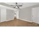 Large bedroom with light-colored floors and convenient access to laundry room at 2220 Ross Cauthen Rd, Lancaster, SC 29720