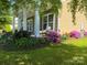 Charming home featuring a quaint covered front porch and colorful landscaping at 353 Montibello Dr, Mooresville, NC 28117
