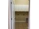 Compact laundry room with tile floors, white cabinets, and essential connections at 353 Montibello Dr, Mooresville, NC 28117