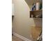 Small laundry area with shelves, beige walls and tile flooring at 353 Montibello Dr, Mooresville, NC 28117