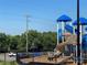 Community playground with slides, climbing structures and ample space for children to play at 353 Montibello Dr, Mooresville, NC 28117