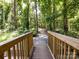 Wood footbridge along walking trail at 4148 Cedar Point Ave, Matthews, NC 28104