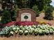 Chestnut Place brick sign with flowers at 4148 Cedar Point Ave, Matthews, NC 28104