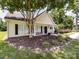 Charming single-story home with a well-manicured lawn and inviting entryway at 4148 Cedar Point Ave, Matthews, NC 28104