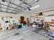 Spacious two-car garage with ample storage and lighting at 4148 Cedar Point Ave, Matthews, NC 28104