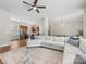 Open-concept living space showcasing a seamless transition to the kitchen and dining areas, filled with natural light at 4148 Cedar Point Ave, Matthews, NC 28104