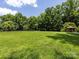 Large grassy soccer field with goal and gazebo, surrounded by trees at 4148 Cedar Point Ave, Matthews, NC 28104