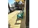 A lakeside deck offers Adirondack chairs for relaxing with serene views and fresh air at 141 Sunrise Pt, New London, NC 28127