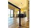A bright open-plan kitchen features modern cabinets, stainless steel appliances, and stylish pendant lighting at 141 Sunrise Pt, New London, NC 28127