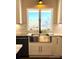 Farmhouse kitchen sink with a view of the outdoors at 141 Sunrise Pt, New London, NC 28127