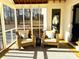 Cozy screened porch with comfortable seating and a private outdoor view at 141 Sunrise Pt, New London, NC 28127