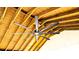 Stylish ceiling fan under a wooden beam ceiling, blending aesthetics with comfort at 141 Sunrise Pt, New London, NC 28127
