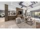 Elegant lounge with a modern fireplace, comfortable seating, and sleek design elements at 19329 Watermark Dr # 142, Cornelius, NC 28031