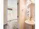 Half bathroom with a pedestal sink and an open doorway to a bedroom at 1111 Johns Walk Way, Belmont, NC 28012