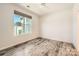 Empty staged bedroom featuring hardwood floors and a large window at 1111 Johns Walk Way, Belmont, NC 28012